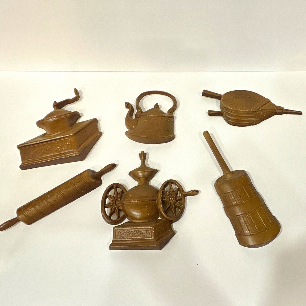 Set of 6 vintage Sexton cast metal wall hangings.